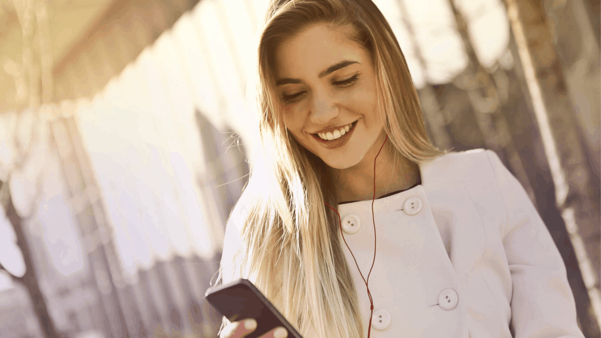 Woman listening to Spotify with earphones